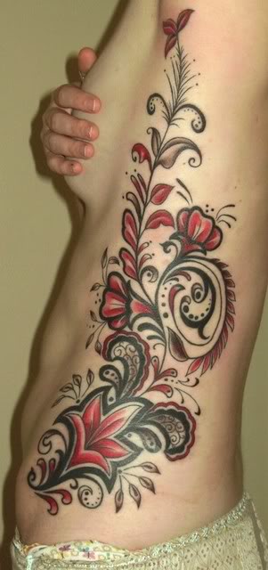 flower side tattoos. side tattoo. side tattoos for