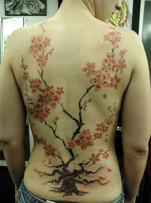 Daisy+tattoos+on+hip