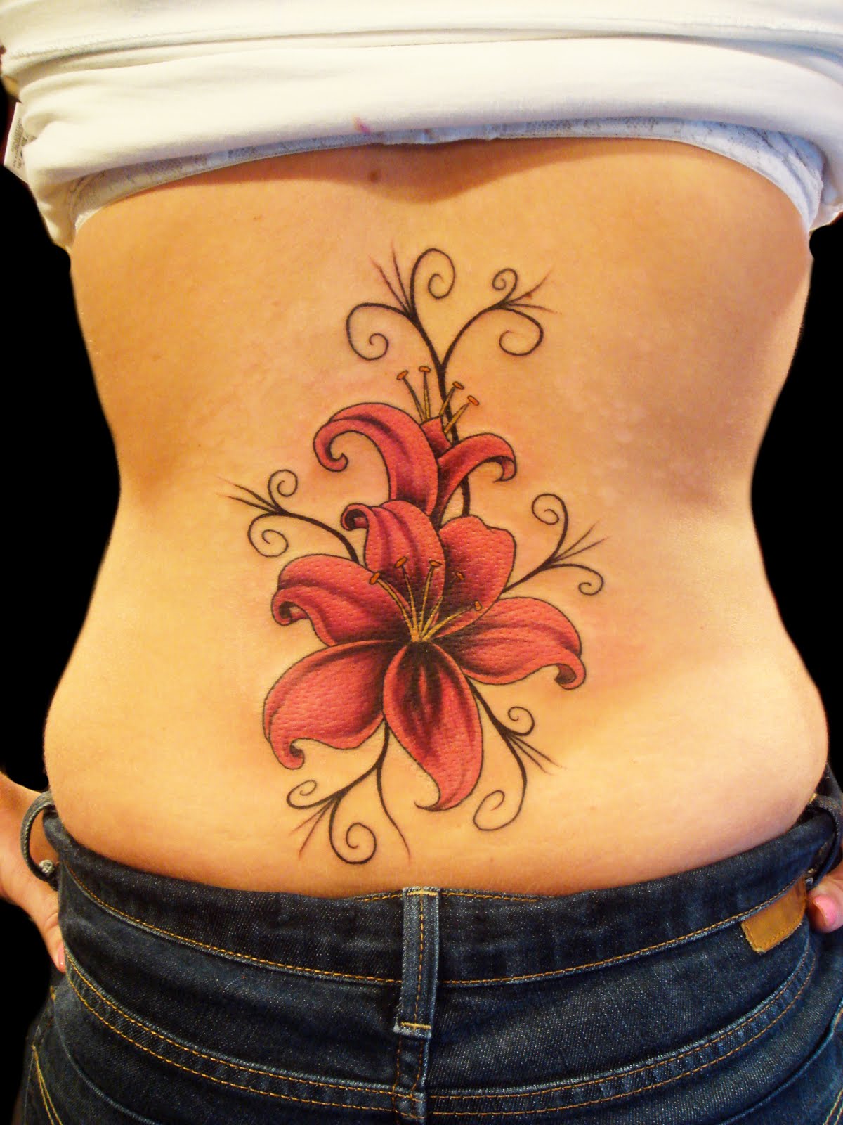 http://4.bp.blogspot.com/_eXB-dCzFSus/TPVdv23VqnI/AAAAAAAADNc/Kb_40hNm20U/s1600/Best%25252525252BFlower%25252525252BTattoo%25252525252BDesigns%25252525252B-%25252525252BThe%25252525252BLily%25252525252BTattoo%25252525252B1.jpg