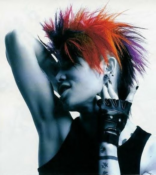 At this punk Mohawk hairstyle a strip of hair across the high from the head 