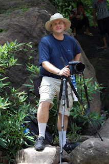 Me photographing the waterfall. I traversed slippery rocks and endured humid temperatures to get to my spot. It took me about 30 minutes to reach 'the spot.'