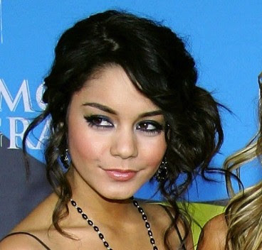 Though short bangs may suit curly hair, it's common for women to sport Though short bangs may suit curly hair, it's common for women to sport