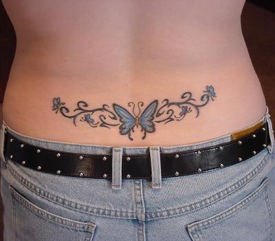 Sexy Girl With Design Butterfly Tattoo On The Lower Back