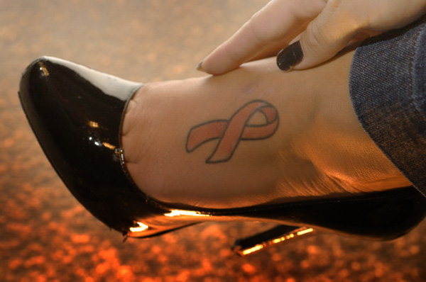 symbol pink ribbon tattoo designs foot. It seems logical that someone who has gone through a 