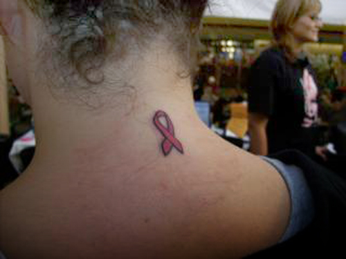 in Margaret Menzie's pink ribbon tattoo at Boardwalk Ink Thursday.