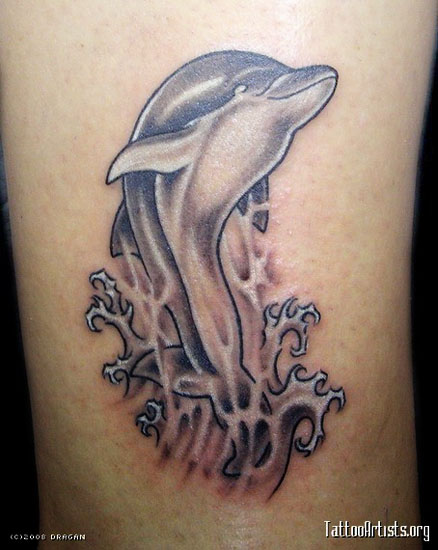 1) Dolphin Tattoos - Due to the cute nature of these designs,