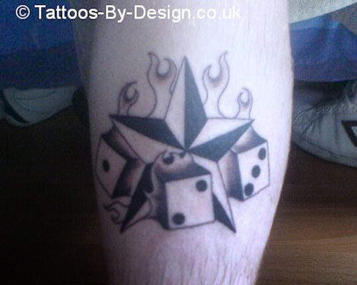 Black nautical star tattoo