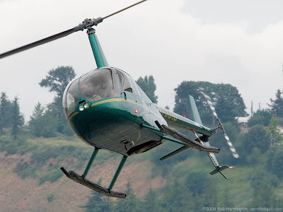 How do helicopters stay floating in the air?