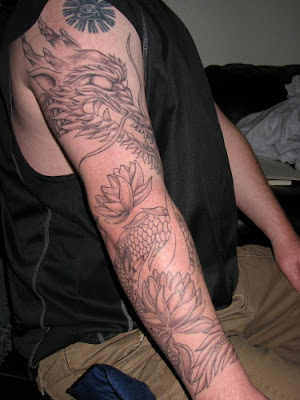 Chinese Sleeve Dragon Tattoo with flower tattoo Chinese Sleeve Dragon Tattoo with flower tattoo