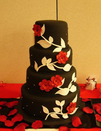 Black And White Wedding Cakes With Red Roses. Her wedding dress even had