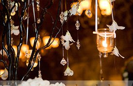 A elegant display of hanging crystals and candles.