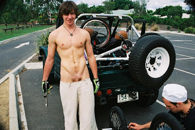 He's smiling because of what he's going to do with that wrench, obviously.