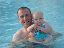 Jenna and her daddy (our son) swimming
