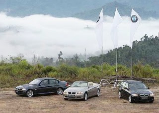 Three flavours: (from left) the Sports sedan, Convertible and Touring pose for a family snapshot.