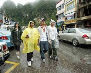 Some of the participants braving the rain to get their assignments.