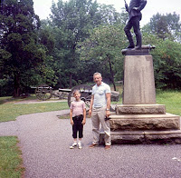 father and son at gettysburg monument father and son at gettysburg monument