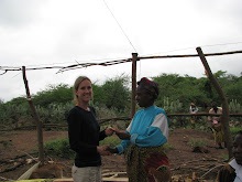 Judi giving a microfinance loan