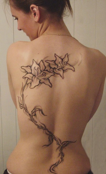 cholo tattoo. back tattoos for girls.