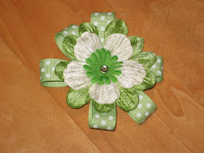 Green blossom with dotted ribbon