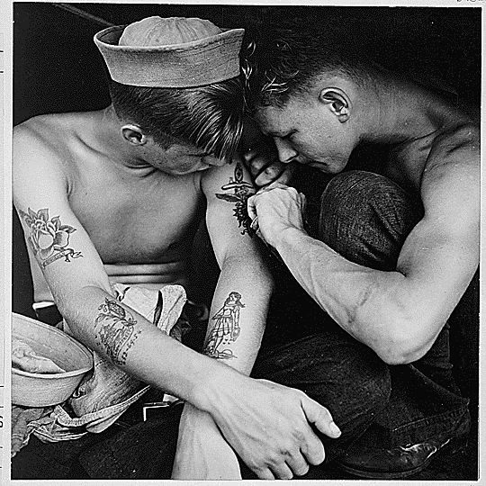 anchor, traditional sailor girl tattoo. Tattoos still remain popular among