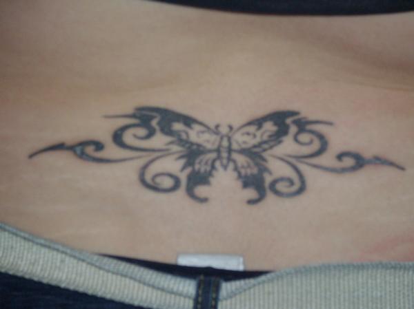 Label: Lower Back Butterfly Tattoo Style