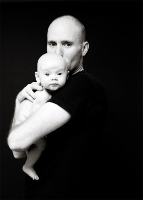 father and daughter photo on black