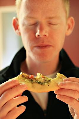pesto pizza eater