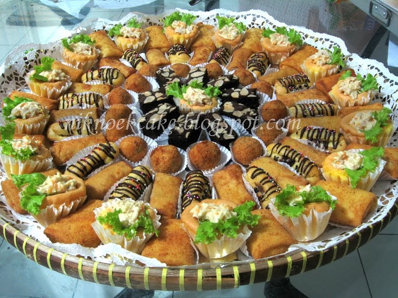 Niknoek Cake Kue Tampah UniSadhuguna