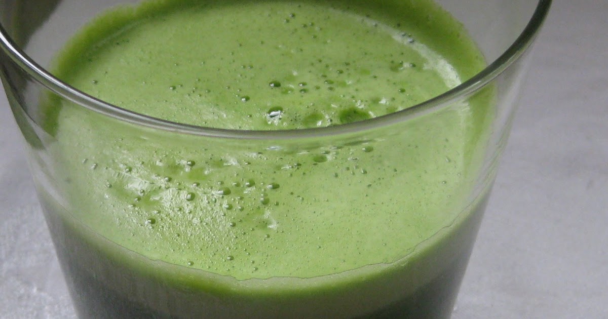 healthy girl cooking AppleSpinach Juice