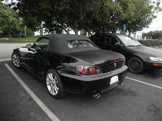S2000 with dull, lacquer checked paint before repairs at Almost Everything Auto Body Repair & Car Paint
