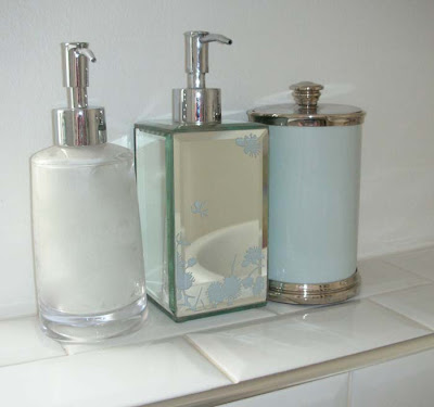 Bathroom dispensers Bathroom dispensers: clear acrylic from John Lewis, mirrored soap dispenser from Marks and Spencer, enamelled canister from Restoration Hardware