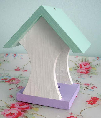 Painted wooden bird feeder Painted wooden bird feeder