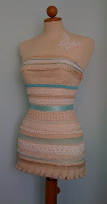 Tailors dummy with pretty trims Tailors dummy with pretty trims in the craft room
