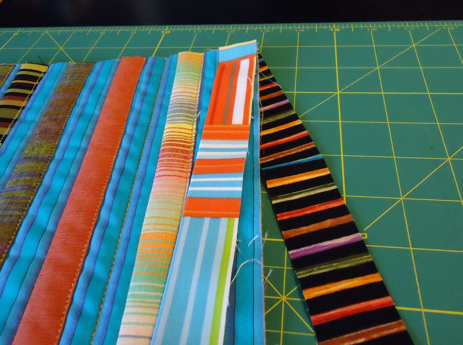 The Quilting Edge Tutorial/QAYG 5 / Joining Blocks with Narrow Strips