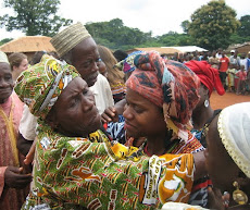 During my Naming Ceremony Tikar Elders Comforts me