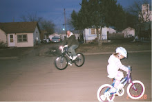 Daddy riding bikes with his big girl.