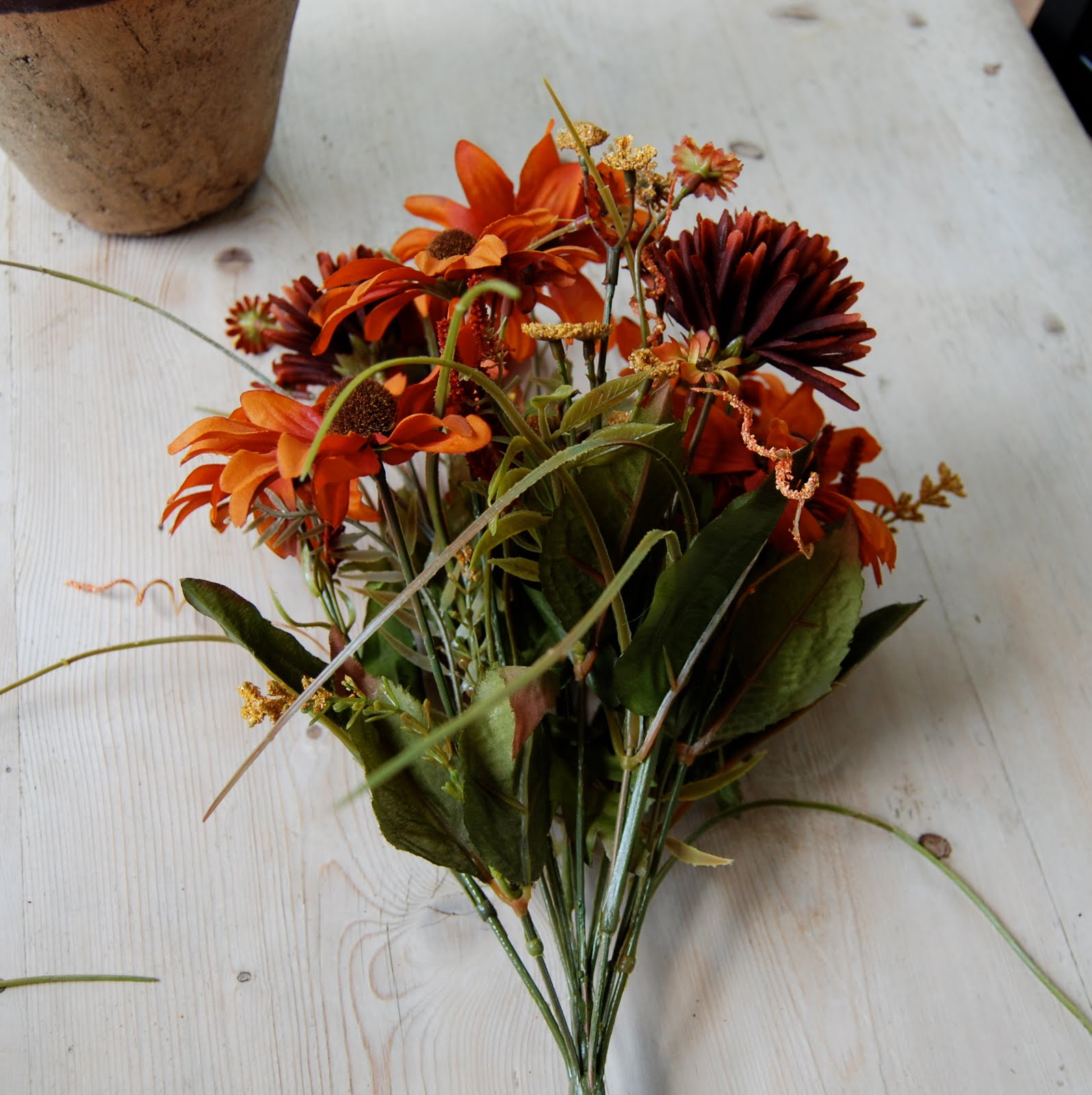 Imparting Grace Arranging silk flowers