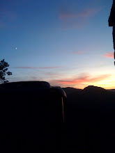 Moon, tractor and sunset