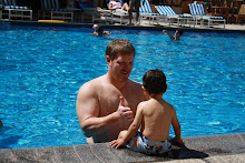 1st day in the pool, daddy is trying to coax him in