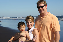 Us at the beach..Mateo wanting to play!