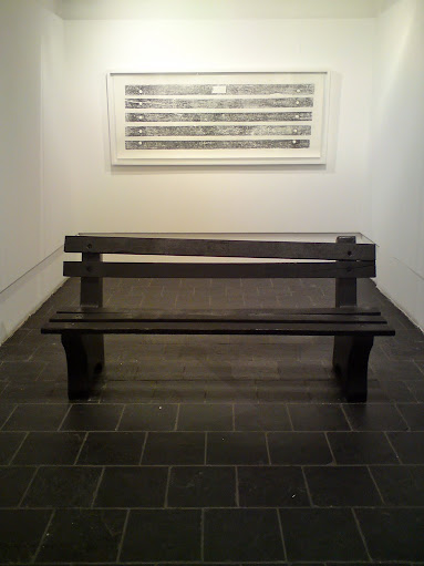 Benchmark (print on cotton paper) 2008, 200 x 60cm and Sit Here and Think Which Way (bench) 2008