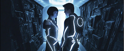 Olivia Wilde and Garrett Hedlund in TRON: Legacy