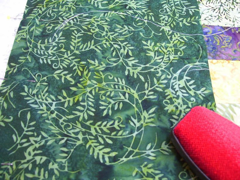 pieceful kwilter marking a quilt for quilting