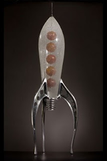 mike slobots likes rik allen mid century modern blown glass rocketships