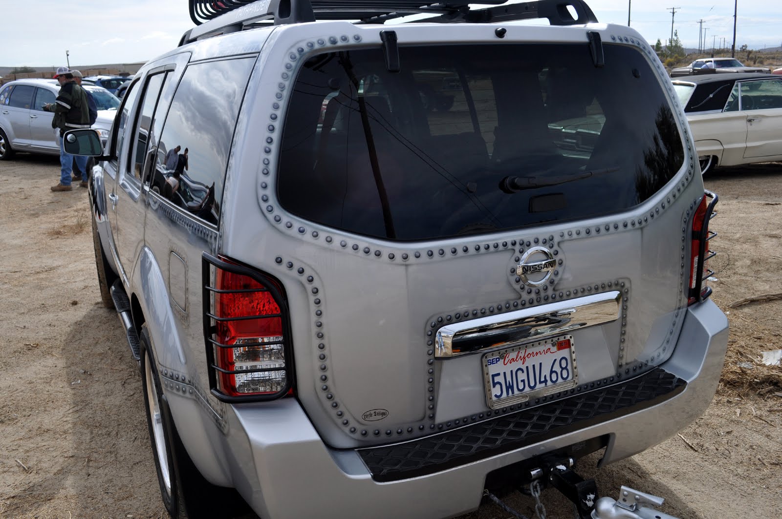 Just A Car Guy Cool looking airbrushed look of riveted panels ala aircraft on this Nissan SUV
