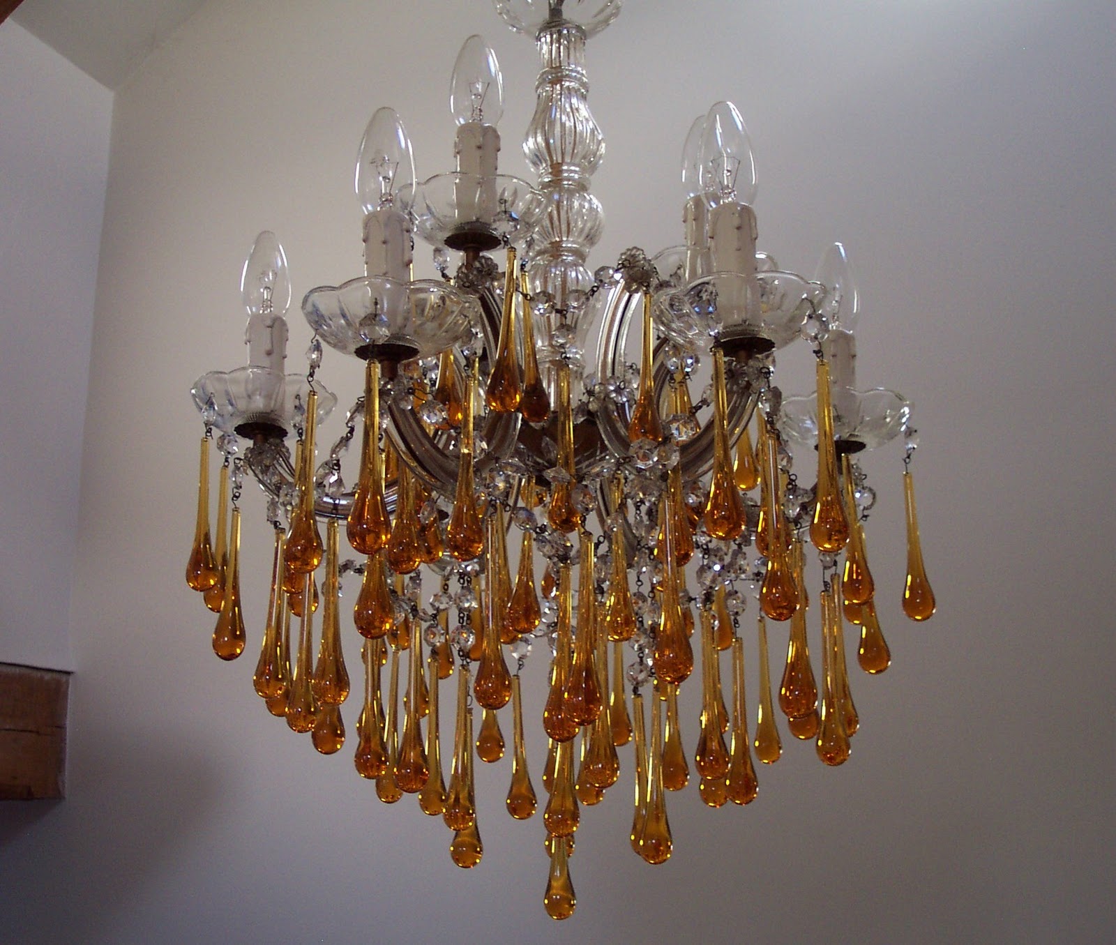 20thcenturycollectables Co Uk Cur Stock 1950s Italian Decorative 9 Light Chandelier Clear Glass Centre And Arms With Solid Amber Drops Diameter 50cm