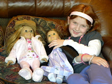 Paisley playing with her dolls