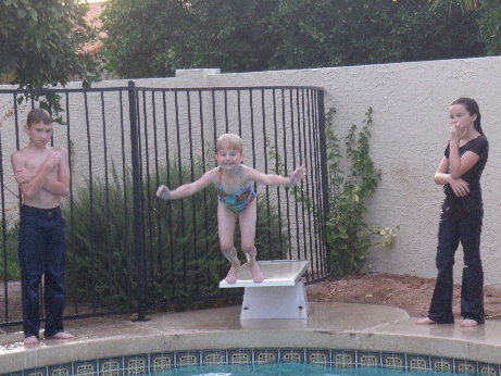 [Swimming_Hallie_jumping_May07.jpg]