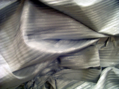 Silver Whisper - silver painted foam packing material recycled found object abstract painted sculptural assemblage avant garde art painting by Tiffany Gholar