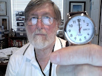 Source: John H strange John Strange holding watch that shows time is almost up
